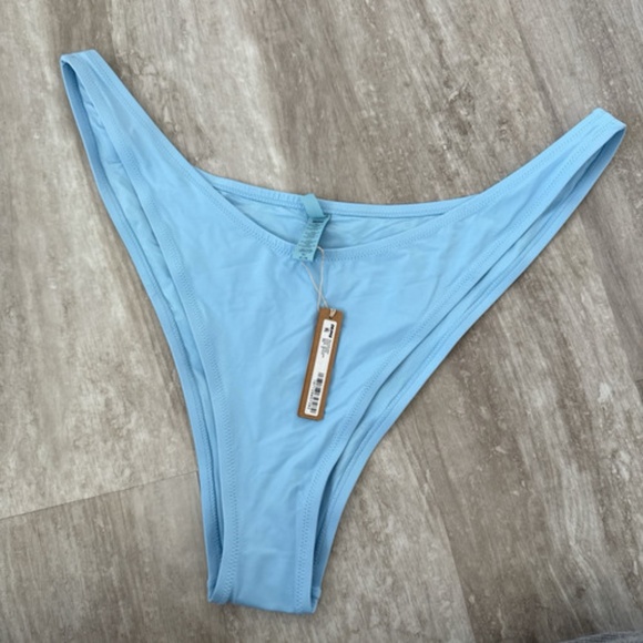 SKIMS Women’s Recycled Swim Cheeky Micro Tanga Color Iris Blue Size 4X NWT - Picture 2 of 4
